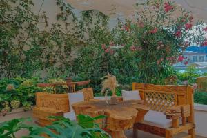 Κήπος έξω από το 夕露小榭南门机场大巴店Xiluxiaoxie MUXIN INN