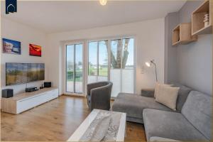 Televiisor ja/või meelelahutuskeskus majutusasutuses DHH am Gothenweg DHH Anemone