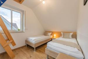 Voodi või voodid majutusasutuse DHH am Gothenweg DHH Anemone toas