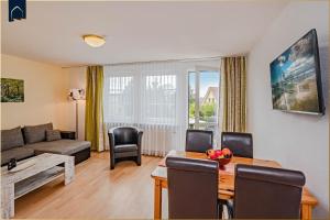 Posezení v ubytování Waldsiedlung Waldhaus App 4.1