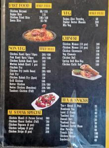 a menu for a restaurant with some food on it at Alif inn in Srinagar