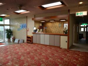 a lobby with a waiting area in a building at Anori Seaside Hotel in Ōsasu +31 photos