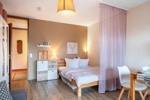 Ένα ή περισσότερα κρεβάτια σε δωμάτιο στο Ferienwohnung Dream +22 φωτογραφίες