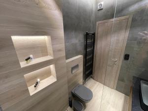 Koupelna v ubytování Kairos luxury apartments Fanari 1 + 13 fotografií