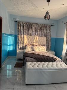 Ένα ή περισσότερα κρεβάτια σε δωμάτιο στο Twin Pines Masvingo +11 φωτογραφίες