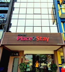 a place sign in front of a building at Place2Stay @ The Mines in Serdang