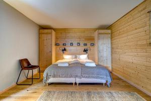 Ένα ή περισσότερα κρεβάτια σε δωμάτιο στο Chalet Panaga