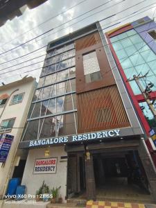 a building with a sign on the front of it at bangalore residency in Srikalahasti