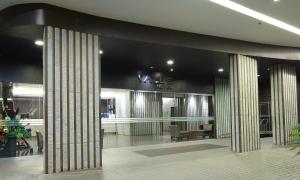 a lobby of a store with columns in a building at Value Hotel Thomson in Singapore