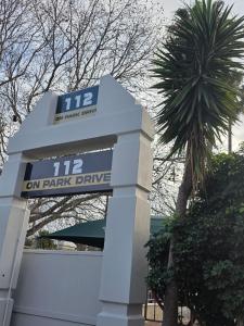 a sign that says on a park drive at 112 on Park Drive in Port Elizabeth