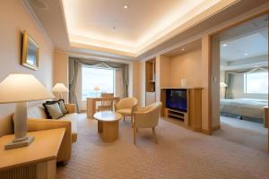 TV a/nebo společenská místnost v ubytování Grand Hotel New Oji