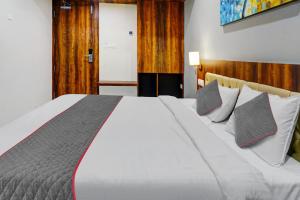 Postel nebo postele na pokoji v ubytování Townhouse Dev's Inn by CJ + 39 fotografií