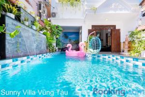 a swimming pool in a villa villa villa villa viking yuan at Villa Hồ Bơi Vũng Tàu Gần Biển - Sunny Villa 109 in Vung Tau +42 photos