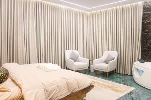 Χώρος καθιστικού στο احسان للشقق المفروشة +5 φωτογραφίες