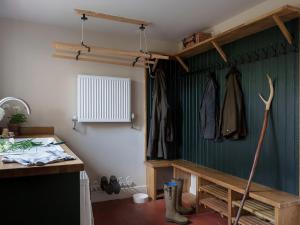 a room with a counter and a room with at Reybridge House in Chippenham +44 photos