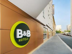 a building with a bbc logo on the side of it at B&B Hotel Prague City in Prague