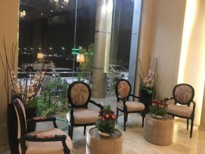 Posezení v ubytování تلال الورد للشقق المخدومة