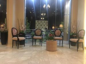 Posezení v ubytování تلال الورد للشقق المخدومة