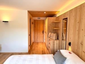 Postel nebo postele na pokoji v ubytování Hotel Gran Fanes