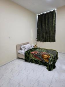 Posteľ alebo postele v izbe v ubytovaní RAK Home + 1 fotografia