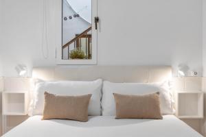 Ένα ή περισσότερα κρεβάτια σε δωμάτιο στο Casa Marbella