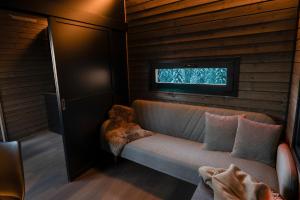 Posezení v ubytování Yllas Forest Cabin for Nature Stay