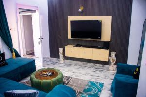 TV a/nebo společenská místnost v ubytování Chicos Apartment