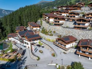 an aerial view of a village in the mountains at Nationalpark Chalet Malhamhorn in Neukirchen am Großvenediger