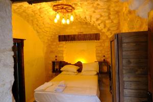 Postel nebo postele na pokoji v ubytování sumatra otel