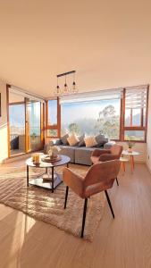 Posezení v ubytování Moderno y exclusivo depto con vista a la laguna grande