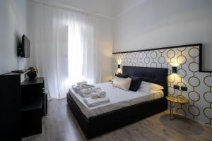 Una cama o camas en una habitación de Verus Room