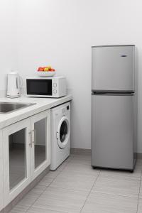 Kuchyň nebo kuchyňský kout v ubytování Your stylish temporary home in Lomé