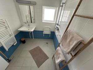 Koupelna v ubytování Gite Au fil de l'eau + 3 fotografie