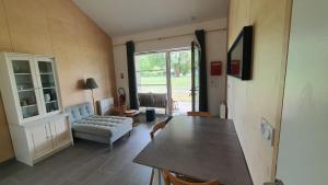 Posezení v ubytování Gite Au fil de l'eau