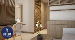 a living room with a table and a dining room at Port Benidorm Hotel & Spa 4* Sup in Benidorm