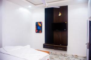 Postel nebo postele na pokoji v ubytování Chicos Apartment