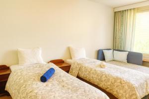 Ένα ή περισσότερα κρεβάτια σε δωμάτιο στο Bright Cozy Private Rooms 3min to Metro