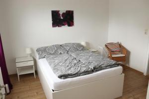 Ένα ή περισσότερα κρεβάτια σε δωμάτιο στο PIER 1