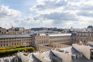 a view of the city from the roof of a building at Hôtel Aoriste & Spa in Paris