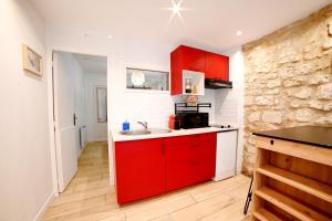 Η κουζίνα ή μικρή κουζίνα στο Le petit cocon +6 φωτογραφίες