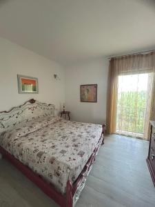 Postel nebo postele na pokoji v ubytování Casa Aurora