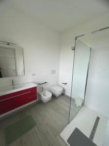 Koupelna v ubytování Casa Aurora + 10 fotografií