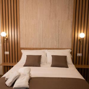 Postel nebo postele na pokoji v ubytování Guest House Aura - Lumys Fiumicino