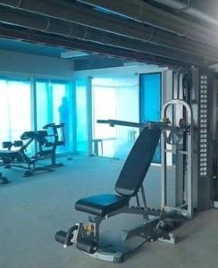 a gym with two exercise bikes in a room at Mesavirre Garden Residences Furnished Units in Bacolod +96 photos