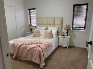 Postel nebo postele na pokoji v ubytování Lucky Home