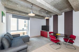 TV a/nebo společenská místnost v ubytování Apartment Accent by Polo Apartments