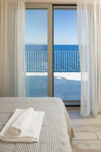 Postel nebo postele na pokoji v ubytování Villas Hvar - Villa Lyra