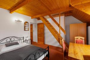 Postel nebo postele na pokoji v ubytování Hotel BELLA