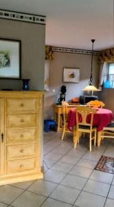 a kitchen with a table and a dining room at Haus Wolfgang in Geldern