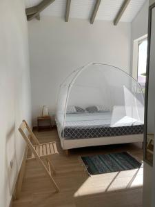 Postel nebo postele na pokoji v ubytování villa LAGON